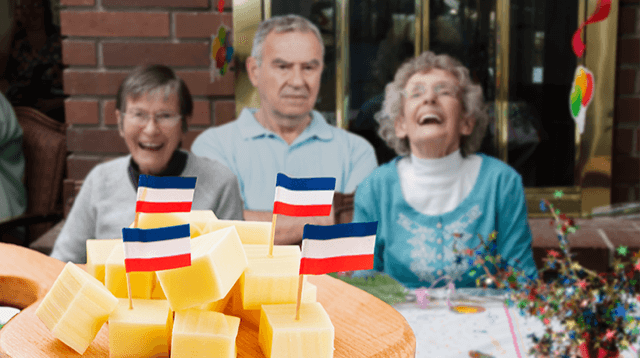 Kringverjaardag ontspoort door omgekeerde Nederlandse vlaggetjes in kaasblokjes